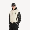 Balenciaga för herrar | Varsityjacka i samarbete med NBA i färgen ivory