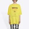 Balenciaga för män, kemtvättad, boxig, med logotryck, lös passform, korta ärmar, gul 651795TKVF87175