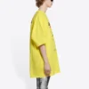 Balenciaga för män, kemtvättad, boxig, med logotryck, lös passform, korta ärmar, gul 651795TKVF87175