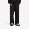 Balenciaga för män | NBA-samarbete, oversized-joggingbyxor i svart/vitt Balenciaga för män | NBA-samarbete, oversized-joggingbyxor i svart/vitt