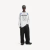 Balenciaga för män | NBA-samarbete: oversized långärmad T-shirt i vitt/flerfärgat Balenciaga för män | NBA-samarbete: oversized långärmad T-shirt i vitt/flerfärgat