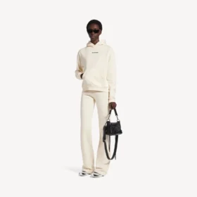 Balenciaga-luvtröja för dam med medium passform och tryck på ryggen i krämfärg