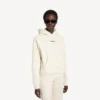 Balenciaga-luvtröja för dam med medium passform och tryck på ryggen i krämfärg