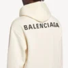 Balenciaga-luvtröja för dam med medium passform och tryck på ryggen i krämfärg