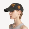 Balenciaga Sacra Cœur-keps för dam i svart Balenciaga Sacra Cœur-keps för dam i svart