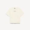 Balenciaga-T-shirt för dam med medium passform och motiv på ryggen i färgen kräm
