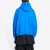 Balenciaga x THE SIMPSONS bomullströja med huva, vid passform ”Blue” 674986TLVG84210