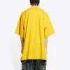 Balenciaga x THE SIMPSONS Oversized bomullströja ”Yellow” 676589TLVG77200