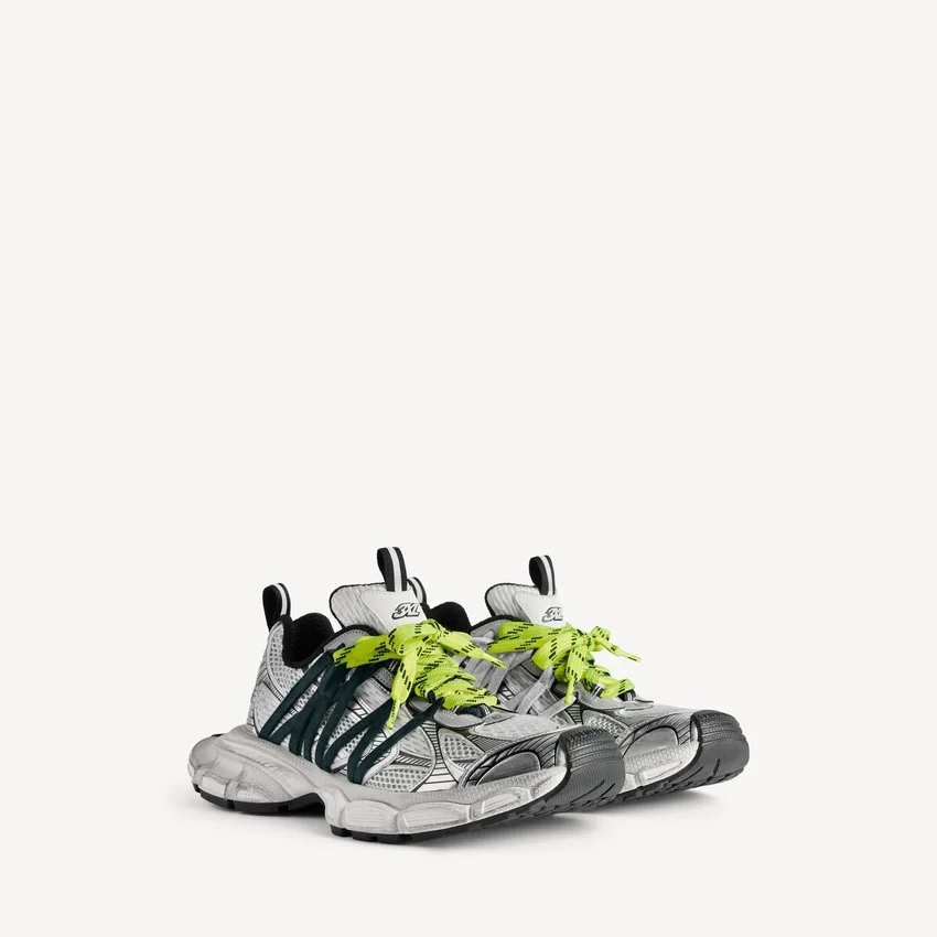 Herr-sneaker i storlek 3XL med korsade snören i grått/neongult Herr-sneaker i storlek 3XL med korsade snören i grått/neongult