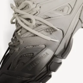 Herr-sneakers i svart/beige med tonad design