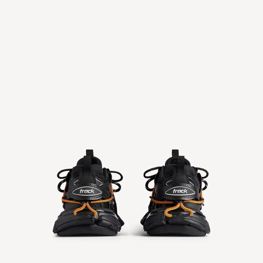 Herr-sneakers med snörning för löpning och terräng i svart/orange Herr-sneakers med snörning för löpning och terräng i svart/orange