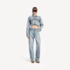 Jeans för dam med tvinnade sömmar i blekt ljusblått Jeans för dam med tvinnade sömmar i blekt ljusblått
