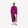 Kort långärmad bodysuit för damer i techwear-stil i violett/orange Kort långärmad bodysuit för damer i techwear-stil i violett/orange
