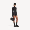 Kort långärmad bodysuit i svart för damer Kort långärmad bodysuit i svart för damer