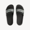 Pool-sandaler för män i svart/vitt Pool-sandaler för män i svart/vitt