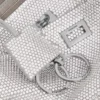 Rodeo-slingpochette för dam med strass i rökgrått