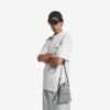 Shoppare för herrar med mobilficka i Balenciaga-grått