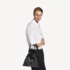 Shopper-väska för herrar med dammpåse och axelrem, medium, i svart