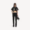 Slim fit-byxor för dam i svart Slim fit-byxor för dam i svart