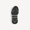 Speed 2.0-sneaker för dam i återvunnen stickad tyg med tvåfärgad sula i svart/vitt Speed 2.0-sneaker för dam i återvunnen stickad tyg med tvåfärgad sula i svart/vitt