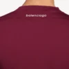 Teknisk, figursydd långärmad herrtröja i vinrött/aqua